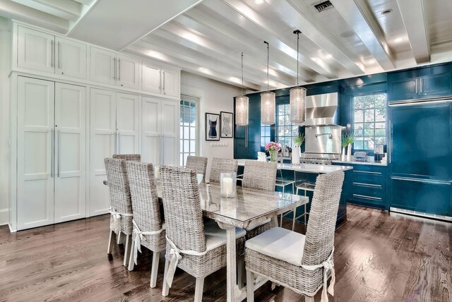 dining room with wood-type flooring