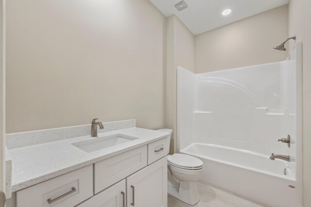 full bathroom with  shower combination, tile patterned floors, toilet, and vanity