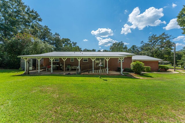 exterior space with a yard