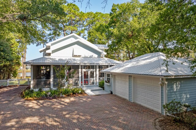 view of front of property with a garage