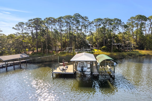 view of dock featuring a water view and boat lift