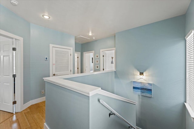 corridor featuring light hardwood / wood-style floors