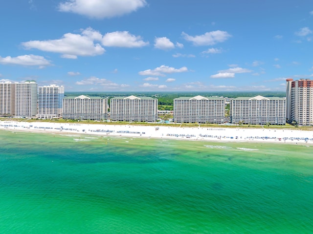 aerial view with a water view, a city view, and a view of the beach