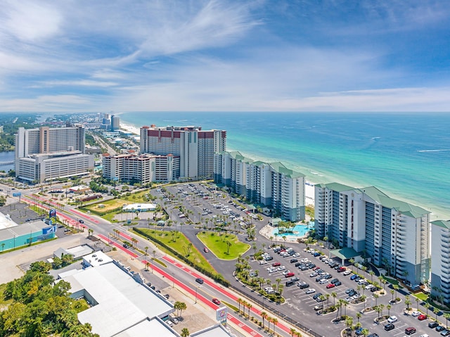 drone / aerial view featuring a view of city and a water view