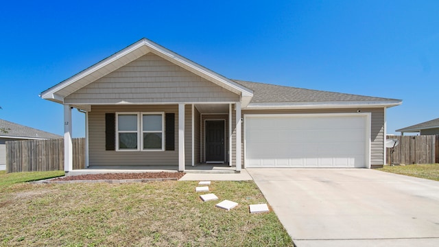 ranch-style house with a front yard and a garage