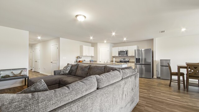 living room with hardwood / wood-style flooring