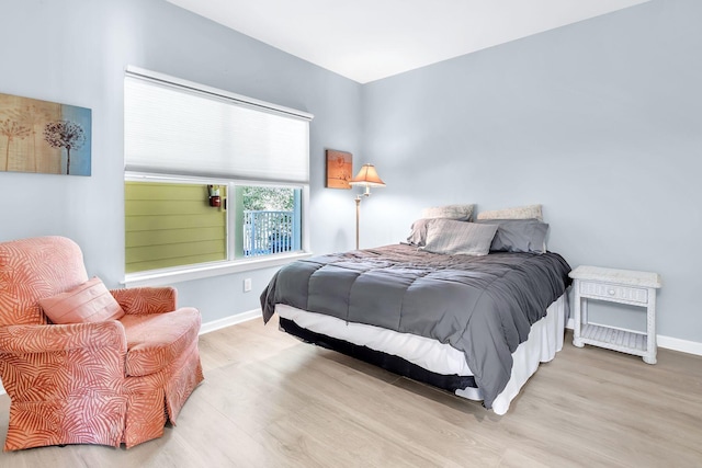 bedroom featuring light wood-type flooring