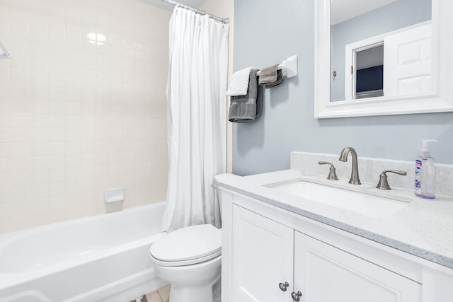 full bathroom with toilet, vanity, and shower / bath combo with shower curtain