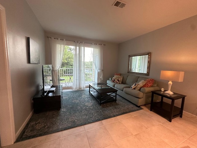 living room featuring light tile patterned flooring