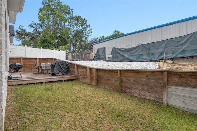 view of yard featuring a deck