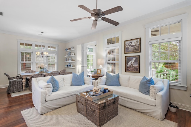1247 Prospect Promenade, Panama City Beach, FL 32413 - living room featuring crown molding, dark wood-type flooring, and ceiling fan with notable chandelier