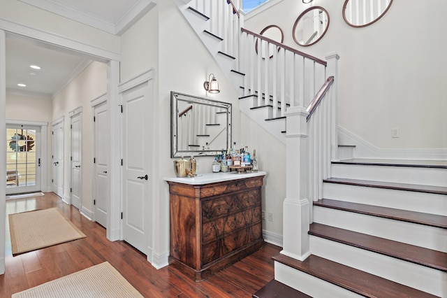 1247 Prospect Promenade, Panama City Beach, FL 32413 - stairway with hardwood / wood-style floors, a healthy amount of sunlight, and ornamental molding