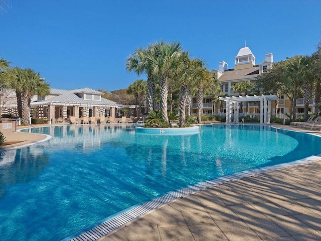 view of pool featuring a pergola and a patio area