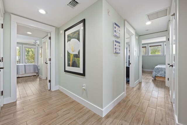 hallway featuring light wood-type flooring