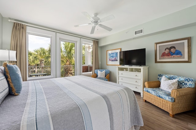 bedroom with ceiling fan and dark wood-type flooring