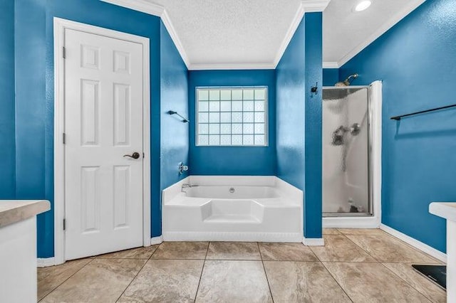 bathroom featuring a textured ceiling, independent shower and bath, ornamental molding, and vanity