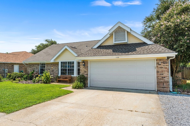 ranch-style house with a front lawn and a garage