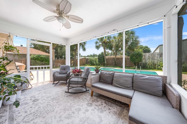 sunroom / solarium with ceiling fan and a wealth of natural light