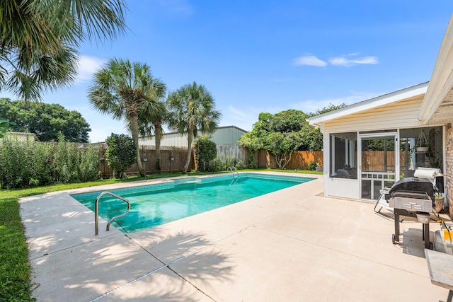 view of pool featuring a patio area