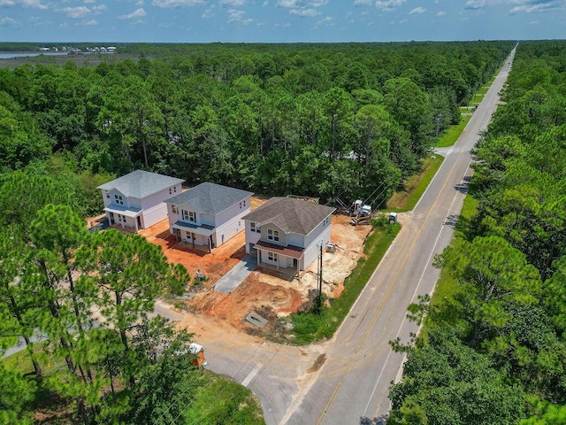 bird's eye view featuring a view of trees