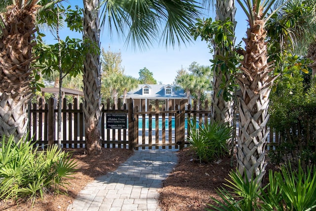 view of gate with fence