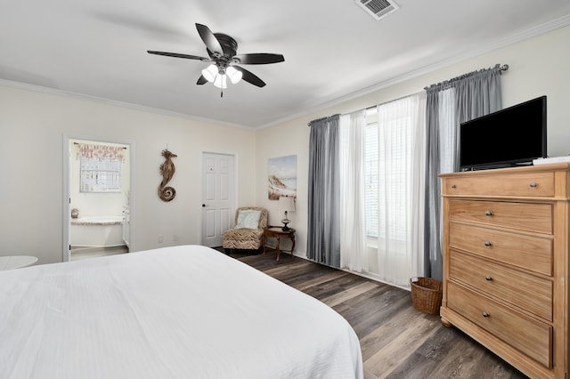 bedroom with ceiling fan, ornamental molding, and dark hardwood / wood-style flooring