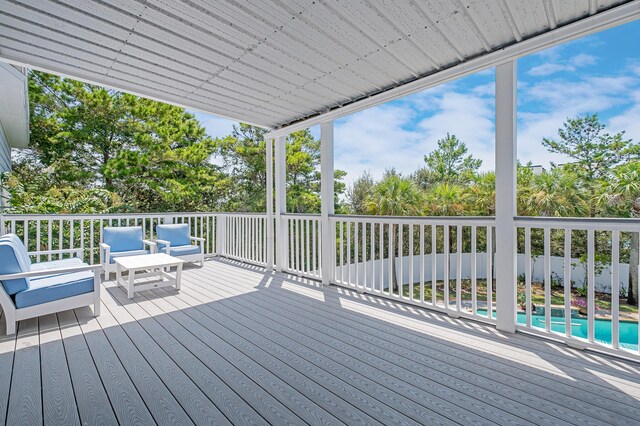 deck with a fenced in pool