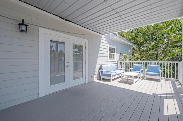 deck featuring french doors and an outdoor hangout area