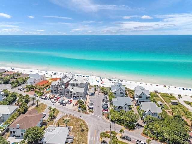 aerial view featuring a water view and a view of the beach