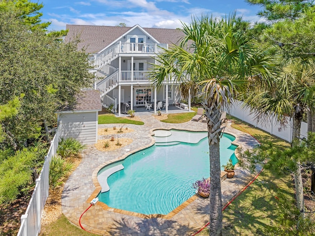 view of swimming pool with a patio