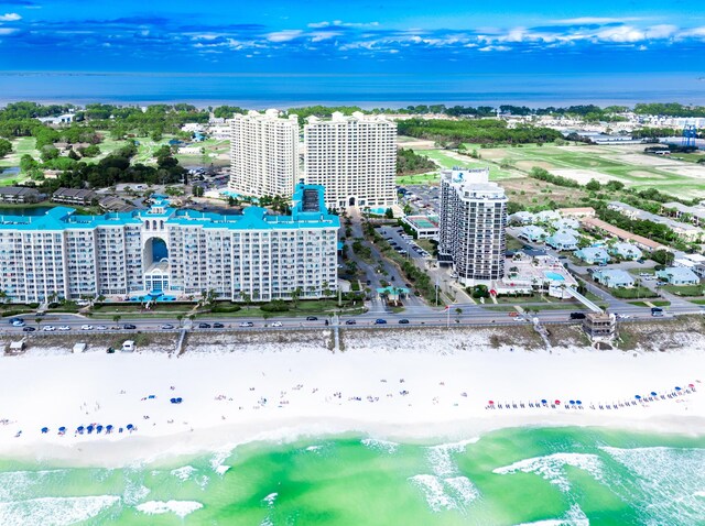 bird's eye view with a beach view and a water view