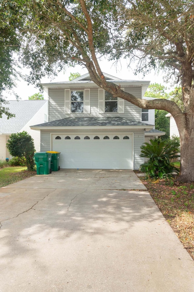 view of front of home featuring a garage and driveway