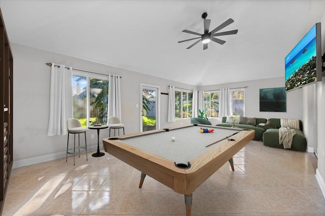 game room featuring light tile patterned flooring, vaulted ceiling, a healthy amount of sunlight, and pool table