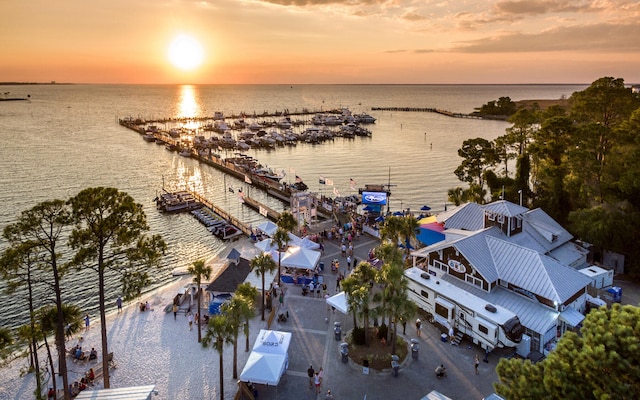 aerial view at dusk with a water view