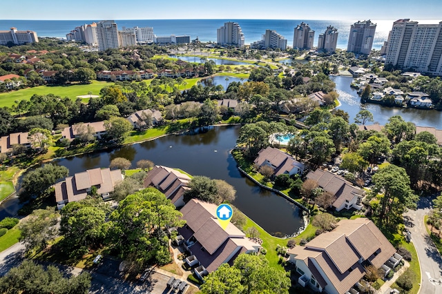 birds eye view of property with a water view