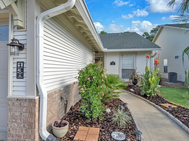 entrance to property with central AC unit