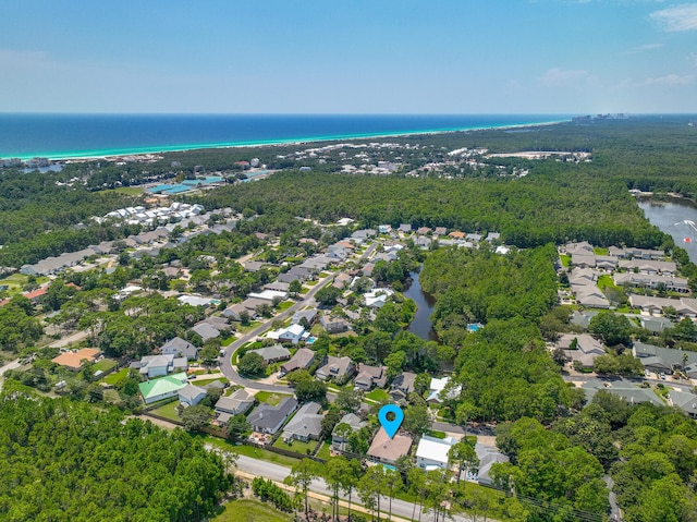 birds eye view of property featuring a residential view and a water view