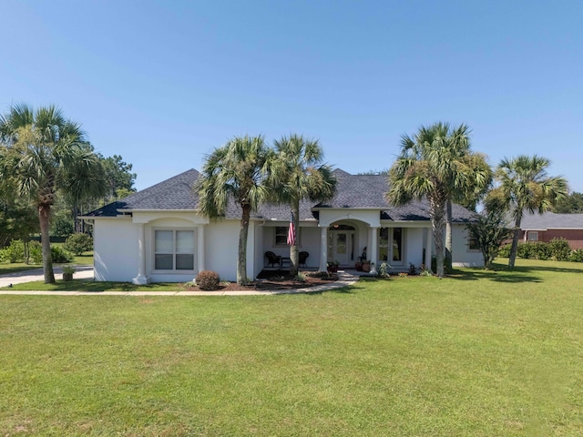 view of front of property with a front lawn