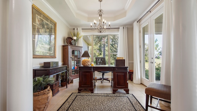 tiled office space featuring a notable chandelier, a raised ceiling, crown molding, and a healthy amount of sunlight