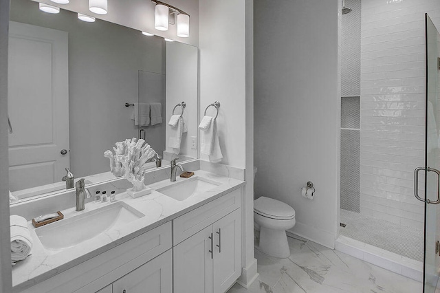 bathroom featuring tile patterned flooring, toilet, double vanity, and walk in shower