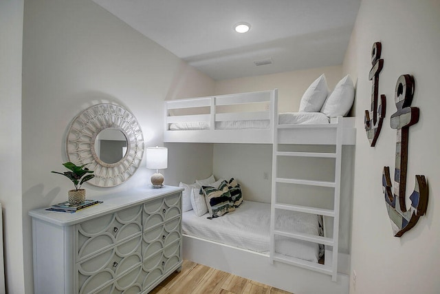 bedroom with light hardwood / wood-style flooring