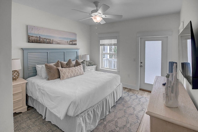 bedroom with ceiling fan and light hardwood / wood-style flooring