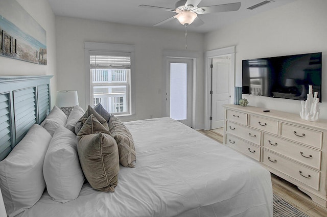 bedroom featuring ceiling fan and light hardwood / wood-style floors