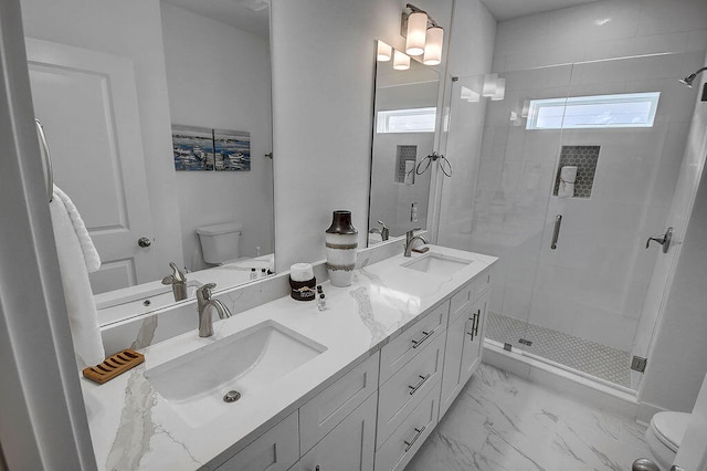 bathroom with toilet, double sink vanity, walk in shower, and tile patterned floors