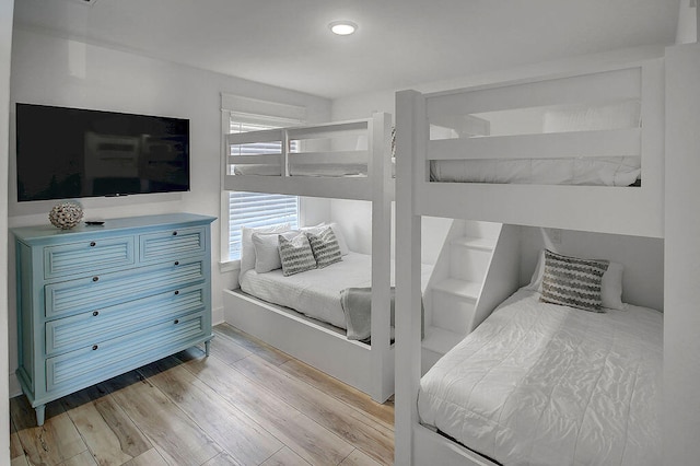 bedroom with light hardwood / wood-style floors