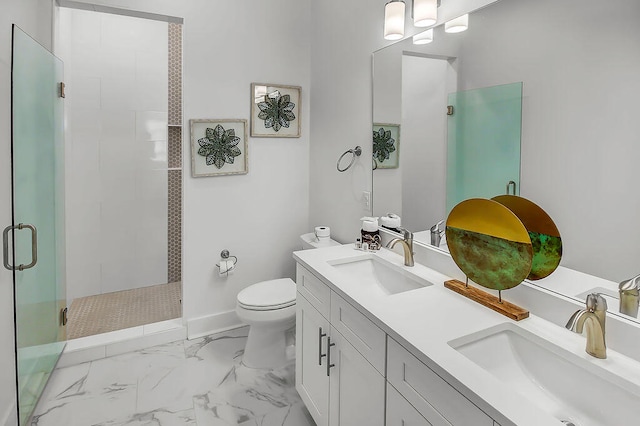 bathroom with tile patterned floors, double sink vanity, a shower with door, and toilet