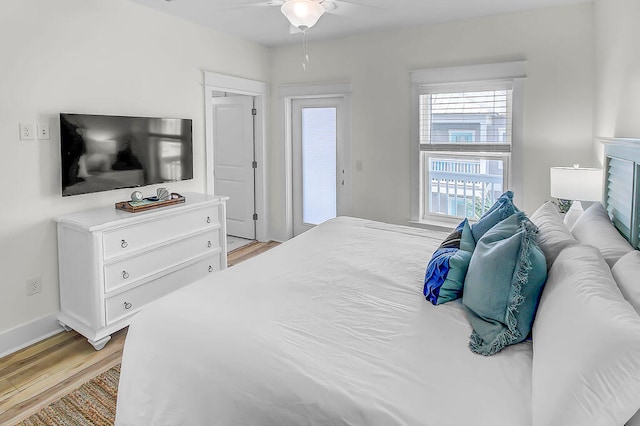 bedroom featuring light hardwood / wood-style floors and ceiling fan