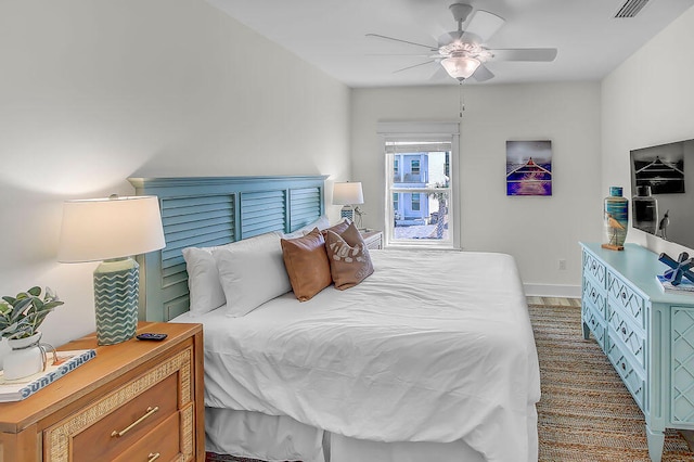 carpeted bedroom featuring ceiling fan