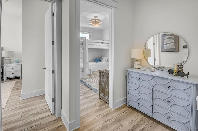 corridor featuring light hardwood / wood-style flooring