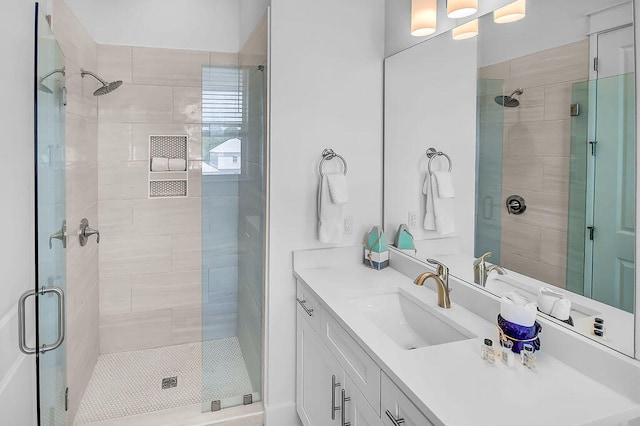 bathroom featuring vanity and walk in shower